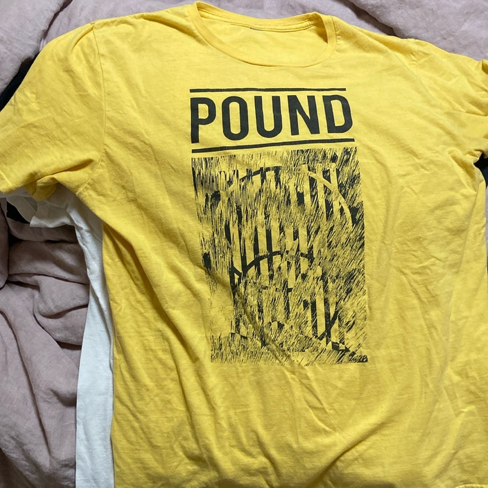 POUND yellow metal tee